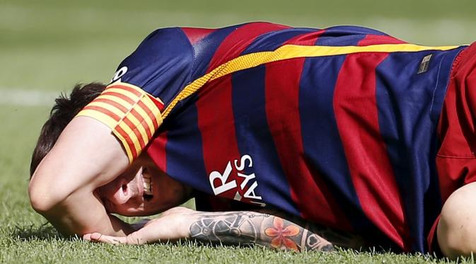 Lionel Messi diperkirakan absen selama 7-8 minggu karena cedera ligamen. REUTERS/Sergio Perez