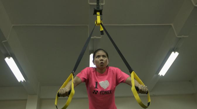 Pebulutangkis ganda putri, Greysia Polii mengikuti latihan fisik di Pelatnas Cipayung, Jakarta, Senin (28/9/2015). (Bola.com/Vitalis Yogi Trisna)