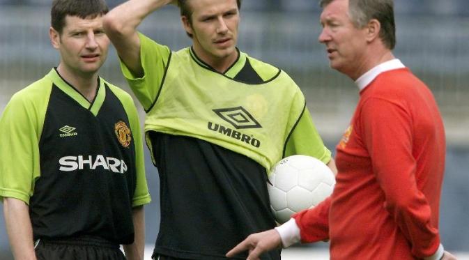 Sir Alex Ferguson dan David Beckham saat masih sama-sama memperkuat Manchester United.