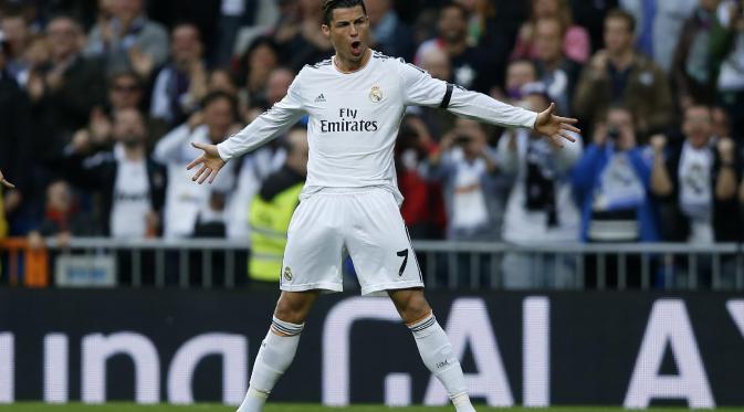 Selebrasi khas Cristiano Ronaldo saat mencetak gol untuk Real Madrid.  (media.zenfs.com)