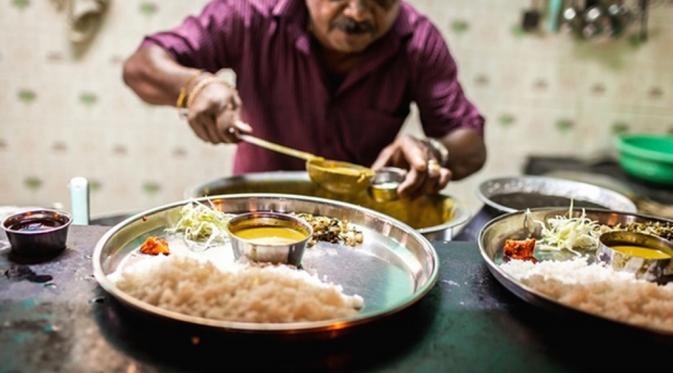 Fish thali (fish with curry and rice)| via: theguardian.com