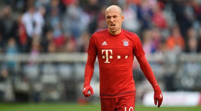 Arjen Robben memntahkan rumor kepindahannya ke Manchester United karena ingin menghormati kontraknya bersama Bayern Munchen. (AFP/CHRISTOF STACHE)