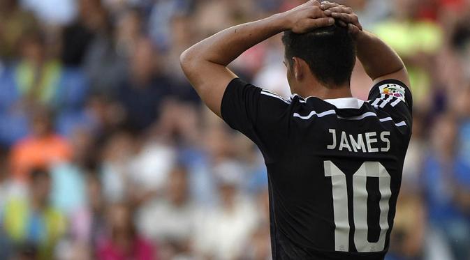 James Rodriguez, gelandang asal Kolombia ini yang kini menjadi empunya nomor 10 di Real Madrid. (AFP Photo/Lluis Gene)