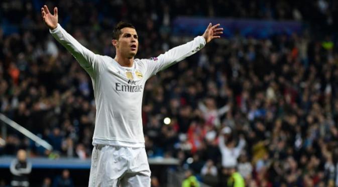 Striker Real Madrid, Cristiano Ronaldo, merayakan gol ke gawang Malmo pada laga di Santiago Bernabeu, Madrid, 8 Desember 2015. (AFP/Pierre-Philippe Marcou)