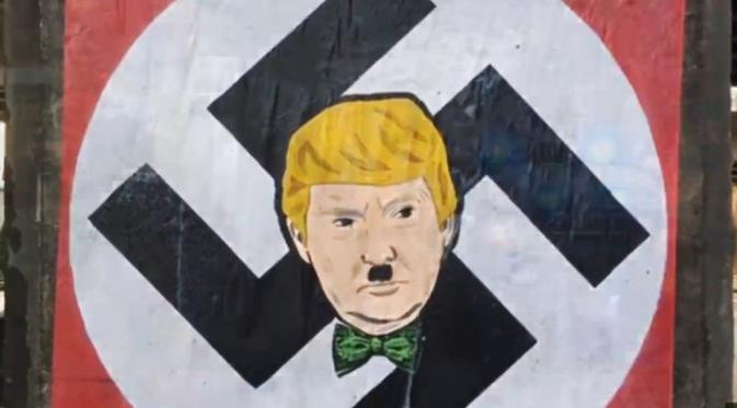 Poster yang memperlihatkan rupa Donald Trump sebagai Hitler terlihat setelah larangan muslim masuk ke Amerika Serikat menyebar.