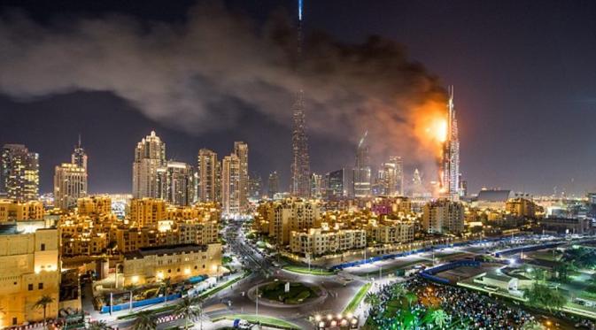 Hotel Address Downtown, Dubai, terbakar pada Kamis (31/12). | via: EPA