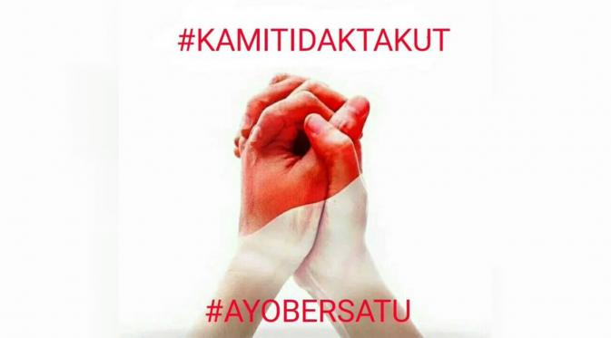 Meme dengan tangan bersatu meminta indonesia untuk bersatu. (via: Twitter)