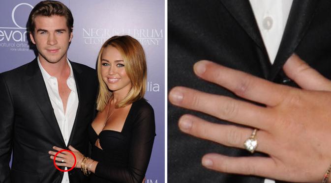 Miley Cyrus memakai kembali cincin tunangannya dari Liam Hemsworth. (foto: huffingtonpost)