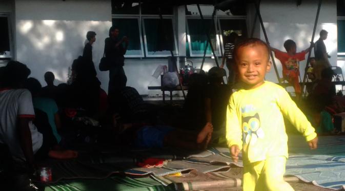 Salah satu bocah yang dipulangkan bersama orangtuanya, eks anggota Gafatar, dari Kalimantan Barat, ditampung di Asrama Transito, Surabaya, Jawa Timur. (Liputan6.com/Dhimas Prasaja)