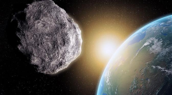 Ilustrasi asteroid mendekati Bumi. (Via: telegraph.co.uk)