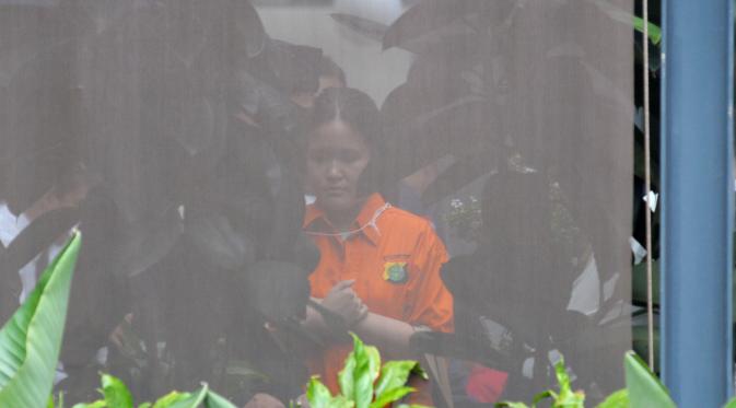 Tersangka Jessica Kumala Wongso hadir dalam rekonstruksi kematian Mirna di Kafe Olivier, Jakarta Pusat. (Liputan6.com/Herman Zakharia)
