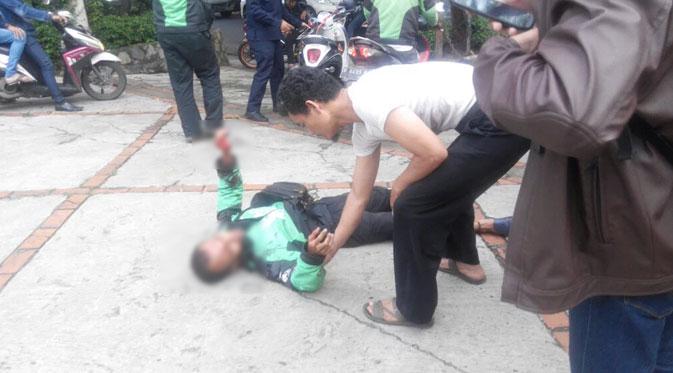 Driver ojek online menjadi korban kekerasan di kawasan Kemang Utara, Jakarta Selatan. (via Twitter)