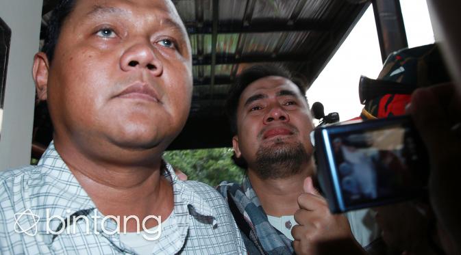 Saiful berusaha tegar menghadapi kasusnya. Kesedihan raut mukanya terlihat jelas. (Deki Prayoga/Bintang.com)