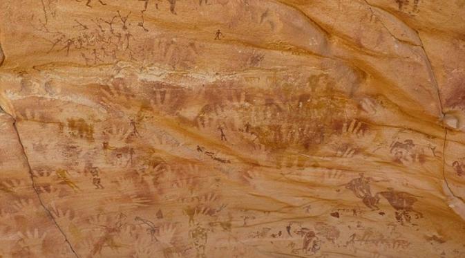 Lukisan di Gua Wadi Sura II mencapai 5.000 gambar dengan umur sekitar 8.000 tahun (Foto: Emmanuelle Honoré)