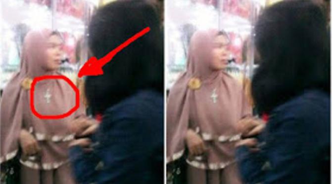 Sebuah foto diunggah memperlihatkan wanita berjilbab sesuai syariat Islam namun berkalung salib. Gambar ini langsung bikin netizen nganga.