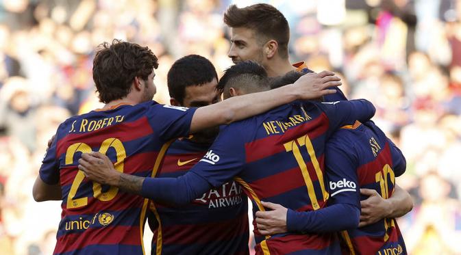 Para pemain Barcelona merayakan gol yang dicetaknya ke gawang Getafe. Selain Messi, gol-gol Barca juga dicetak oleh, Munir, Arda Turan dan dua gol Neymar serta gol bunuh diri oleh Juan Rodriguez. (Reuters/Albert Gea)