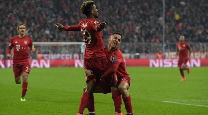 Gelandang Bayern Munchen, Kingsley Coman, merayakan gol ke gawang Juventus pada leg kedua babak 16 besar Liga Champions, di Allianz Arena, Munchen, Rabu (16/3/2016) atau Kamis dini hari WIB. (AFP/Tobias Schwarz)