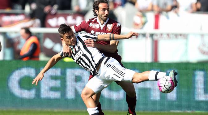 Paulo Dybala mengalami cedera paha saat melawan Torino, bulan lalu.(AFP/Marco Bertorello)