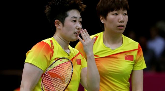 Pasangan ganda putri China, Wang Xiaoli/Yu Yang, salah satu dari empat pasangan yang didiskualifikasi dari Olimpiade London 2012 karena kontroversi pengaturan pertandingan (match fixing). (CBS News)