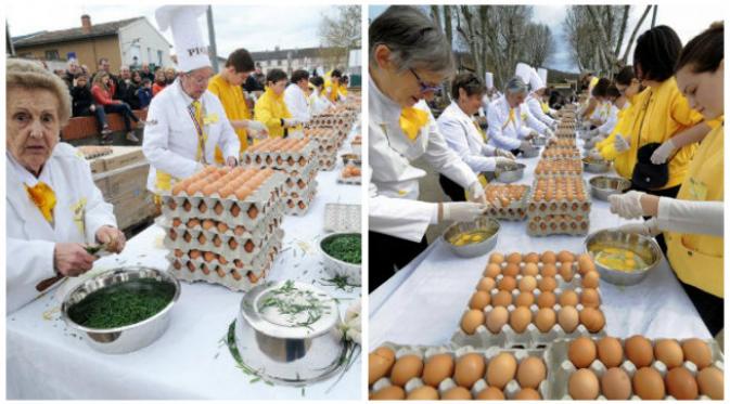 Tradisi telur dadar raksasa di selatan Prancis memerlukan 1500 butir telur dibantu dengan sekitar 50 orang sukarelawan. (Sumber AFP via The Local dan @ladepechedumidi via Twitter)