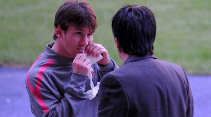 Lionel Messi (kiri) bersama ayahnya, Jorge Messi (kanan). (AFP/Lluis Gene)