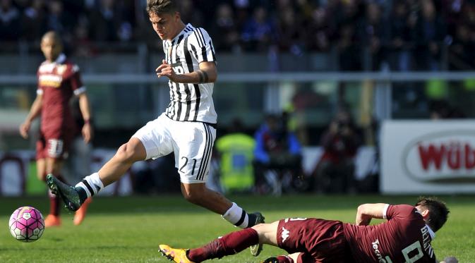 Paulo Dybala beraksi mengenakan seragam Juventus. (Reuters/Giorgio Perottino)