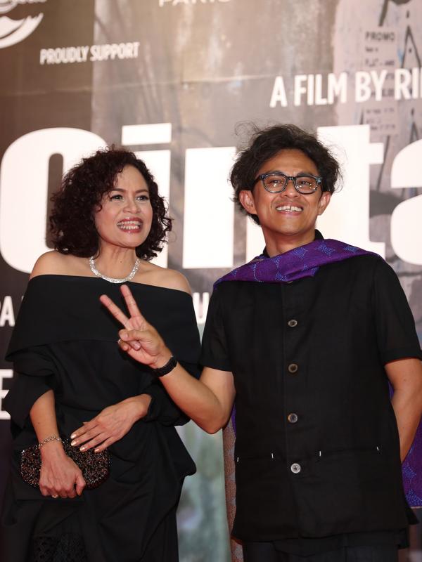Mira Lesmana dan Riri Riza saat premier AADC 2. (Andy Masela/Bintang.com)