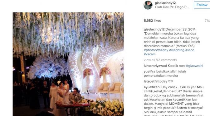 Gracia Indri dan David NOAH saat resepsi pernikahan (Instagram/@ giselacindy12)