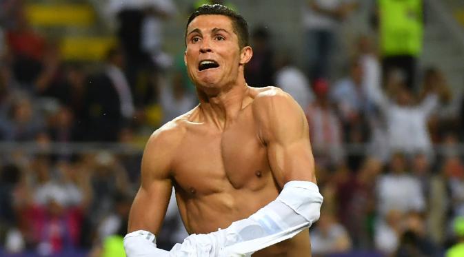 Selebrasi Cristiano Ronaldo usai menjadi penentu kemenangan Real Madrid atas Atletico Madrid di final Liga Champions 2015-16. 