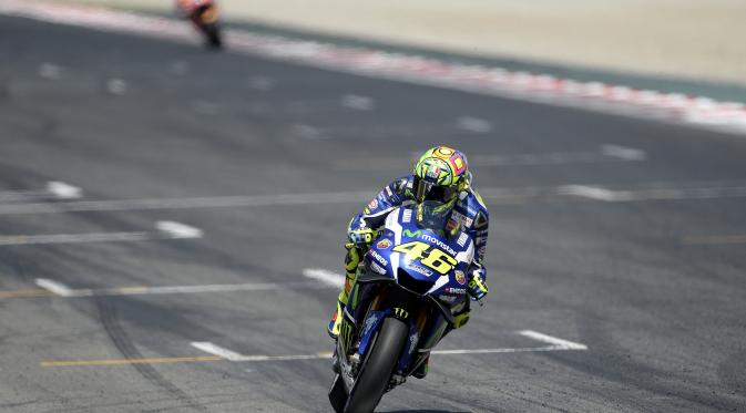 Pembalap Movistar Yamaha, Valentino Rossi. (JOSEP LAGO / AFP)