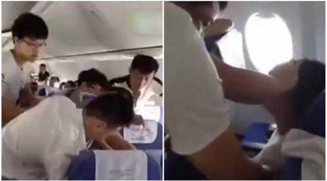 Seorang pria penumpang penerbangan mendadak mendapatkan gangguan mental sesaat, sehingga mengamuk setelah pesawat lepas landas. (Sumber cuplikan video CCTV News)