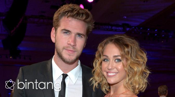 Miley Cyrus dan Liam Hemsworth semakin bahagia. (AFP/Bintang.com)