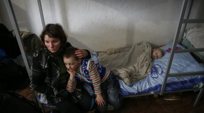 Pengungsi asal Ukraina. (Gleb Garanich/Reuters)