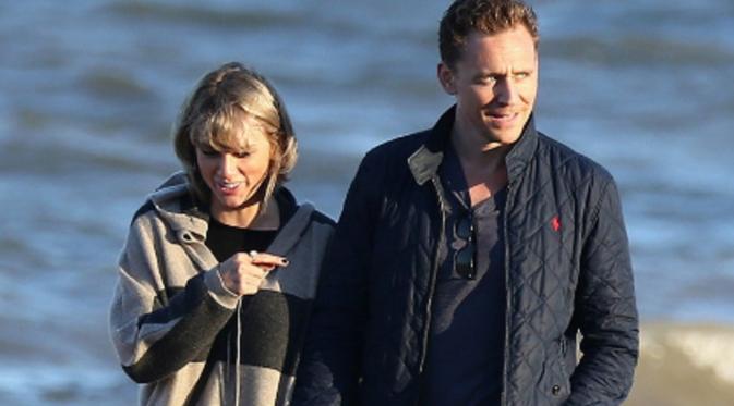 Taylor Swift dan Tom Hiddleston (via. The Sun)