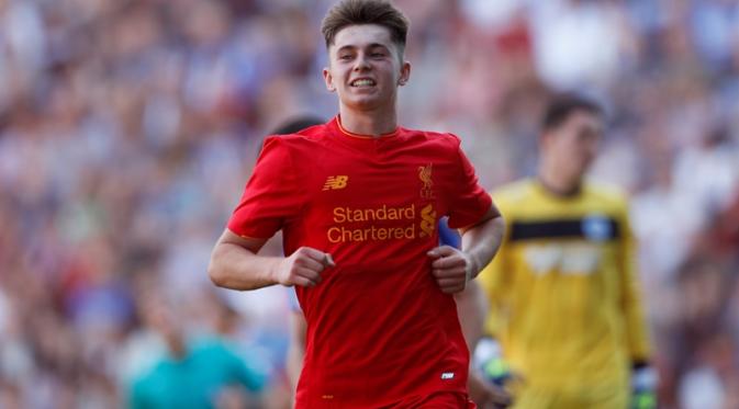 Ben Woodburn berhasil mencetak gol pada menit ke-73 dan turut membawa Liverpool menang 2-0 atas Wigan Athletic di The DW Stadium, Minggu (17/7/2016) malam WIB. (Reuters/Lee Smith)