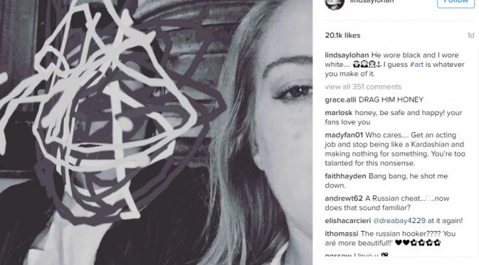 Lindsay Lohan mengunggah fotonya bersama Egor tarabasov yang wajahnya telah ditutupi dengan coretan kemarin (24/7). (via. Instagram/lindsaylohan)