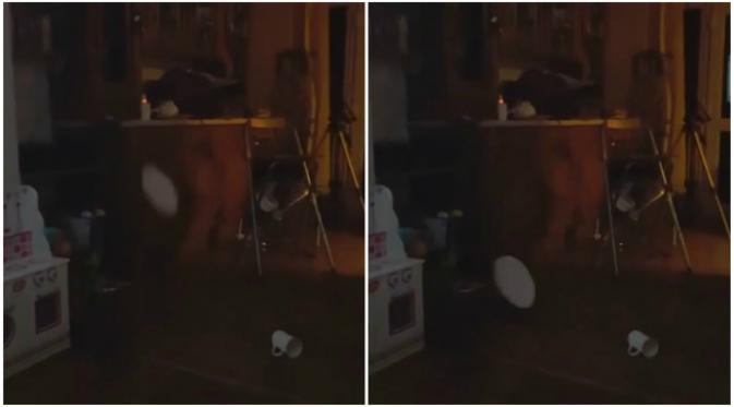 Dalam tayangan terlihat sebuah cangkir dan piring secara misterius terjatuh ke lantai. (Sumber cuplikan video Ian Hawke)