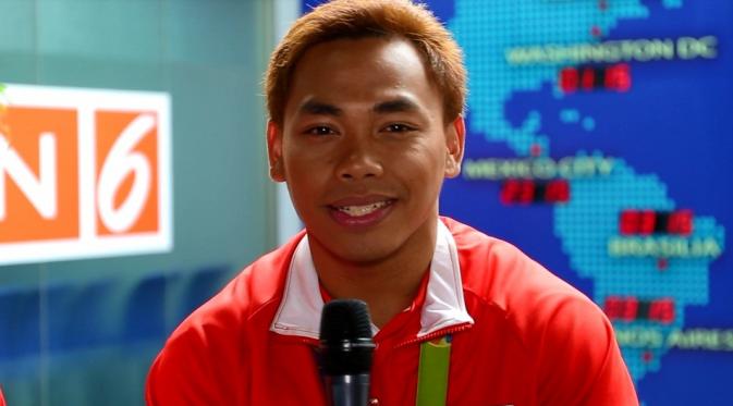 Lifter Indonesia, Eko Yuli Irawan bercerita soal target jangka pendek dan proyeksi emas di Olimpiade Tokyo 2020. (Waliyadin/Liputan6.com)