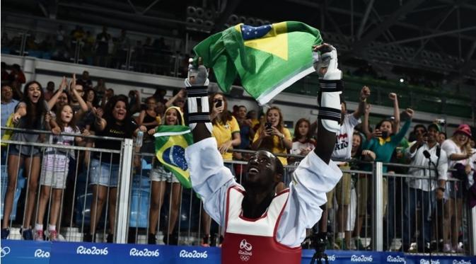 Cheick Sallah Cisse menuntaskan keinginan 20,6 juta rakyat Pantai Gading akan prestasi medali emas pertama di Olimpiade sejak 52 tahun terakhir(AFP/Ed Jones)