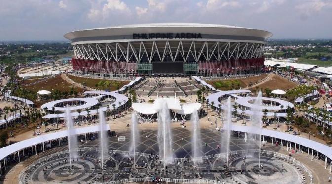 Philippine Arena, bangunan multifungsi megah dalam ruangan yang bisa menampung 55 ribu orang, terletak satu kompleks dengan Philippine Sports Stadium di Ciudad de Victoria. (Bola.com/Inquirer)