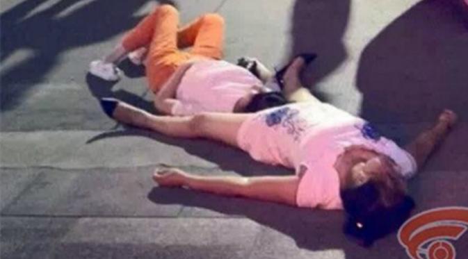 Dua wanita di China pingsan usai bertengkar selama delapan jam (hsw.cn)