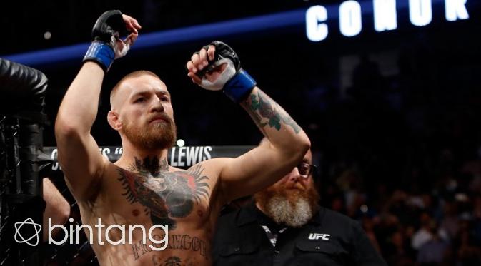 Conor McGregor akan kembali bertanding pada Februari 2017 mendatang. (AFP/Bintang.com)