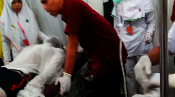 Sejumlah korban akibat ledakan tabung gas di ruko belakang pasar tradisional di Kota Makassar, Sulawesi Selatan. (Liputan6.com, Eka Hakim)