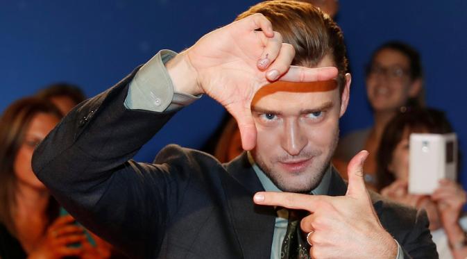 Penyanyi Justin Timberlake berpose setibanya di karpet merah film 