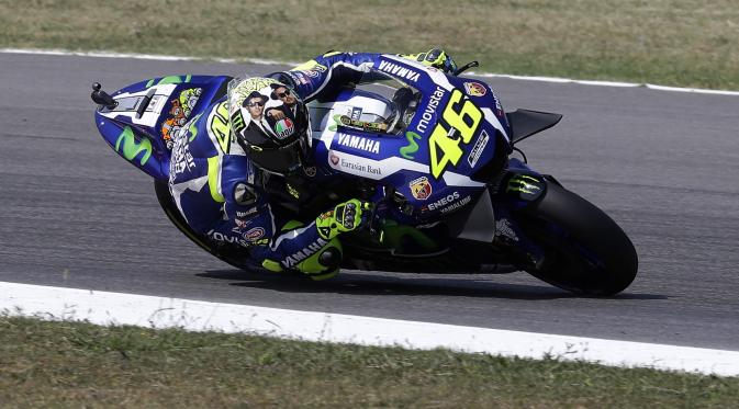  Valentino Rossi salah satu yang gunakan sayap di motor.(AP Photo/Antonio Calanni)