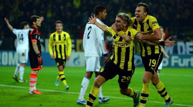 Pemain Borussia Dortmund, Marcel Schmelzer usai mencetak gol ke gawang Real Madrid pada 2012. (Goal.com). 