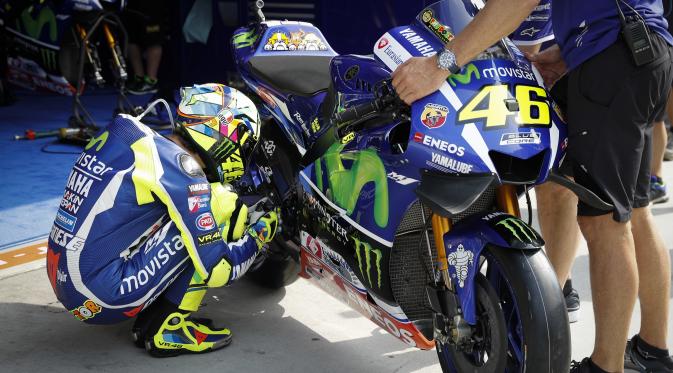 Valentino Rossi, pembalap Movistar Yamaha, siap menjalani balapan MotoGP Malaysia 2016 dalam segala kondisi. (AP Photo/Vincent Thian)