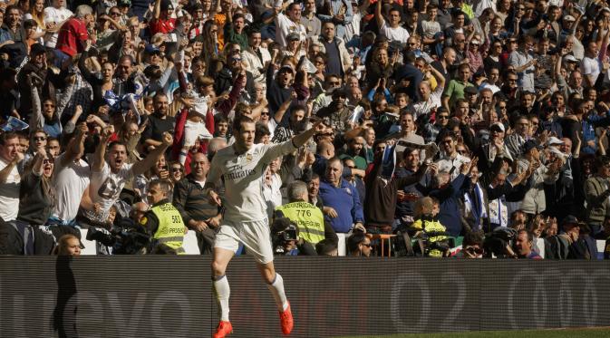 Selebrasi winger Real Madrid, Gareth Bale usai mencetak gol ke gawang Leganes. (AP Photo/Daniel Ochoa de Olza)