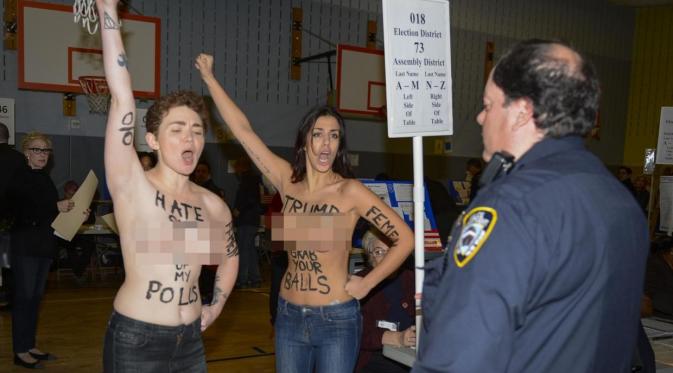 Perempuan telanjang dada kedapatan protes di TPS Donald Trump dalam pemilu Amerika Serikat. (strandard.co.uk)