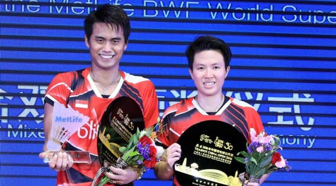 Tontowi Ahmad/Liliyana Natsir sukses menambah koleksi gelar usai memenangi laga final di China Terbuka Super Series Premier 2016, Minggu (20/11/2016). (PBSI)